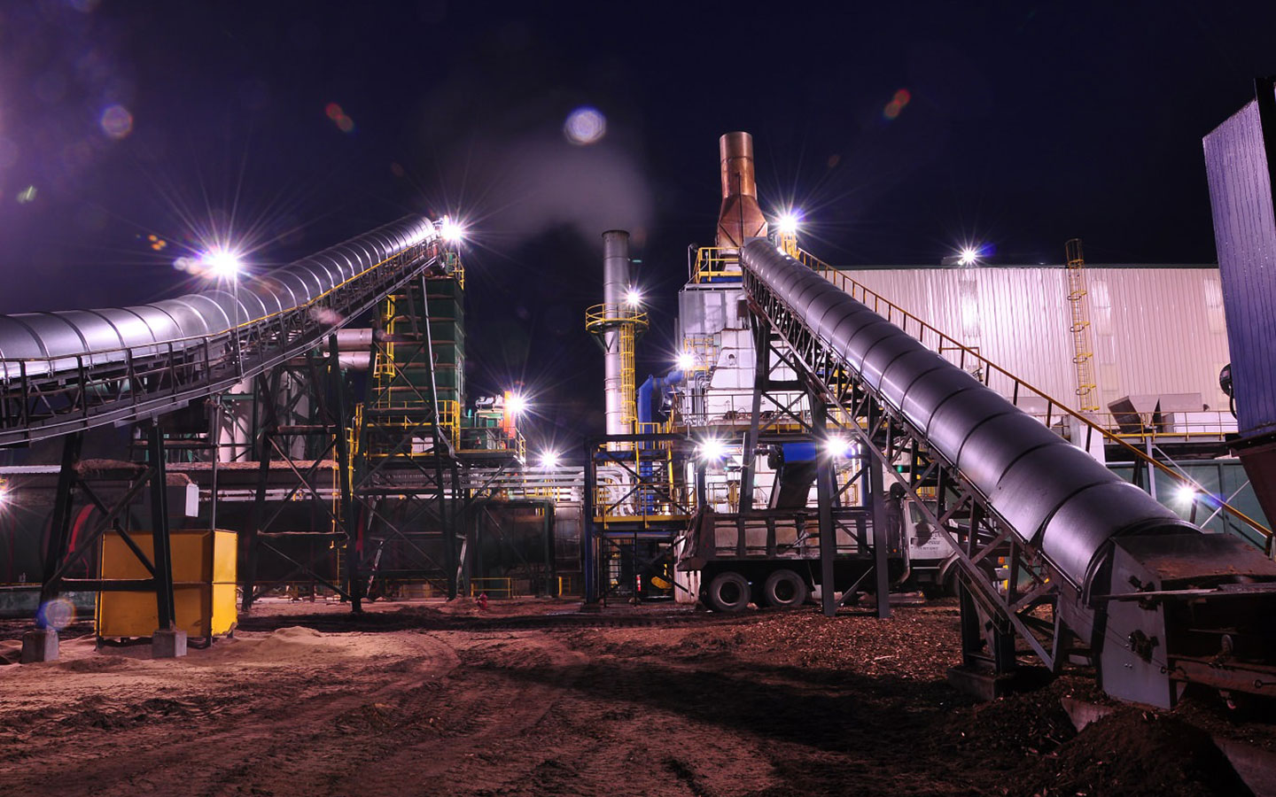 wood pellet factory at night